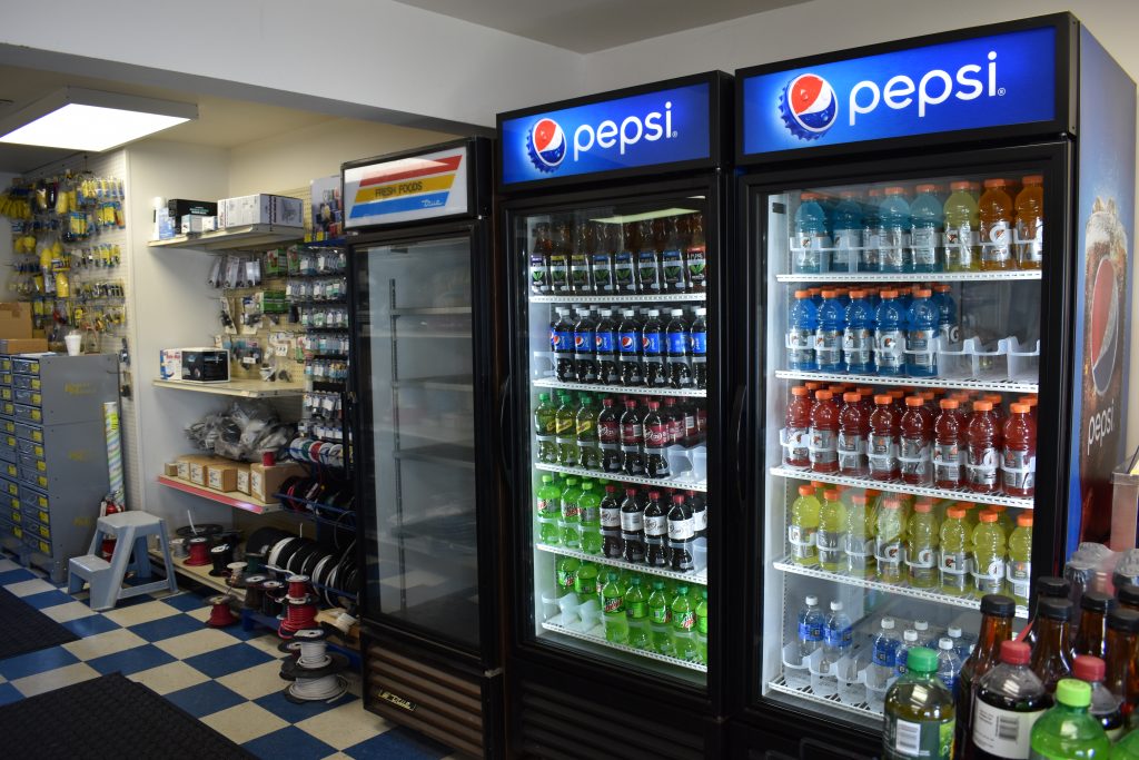 Sodas and other drinks in a refrigeration case