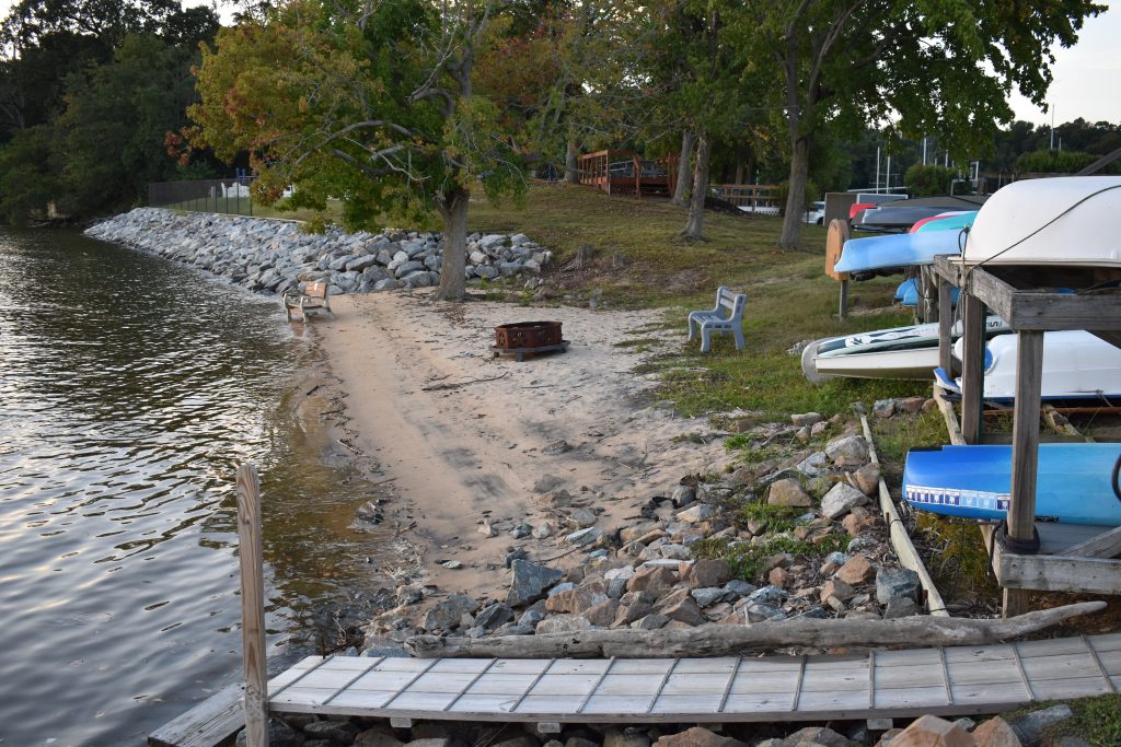 BBYH beach, small craft rack and rip rap along the shoreline