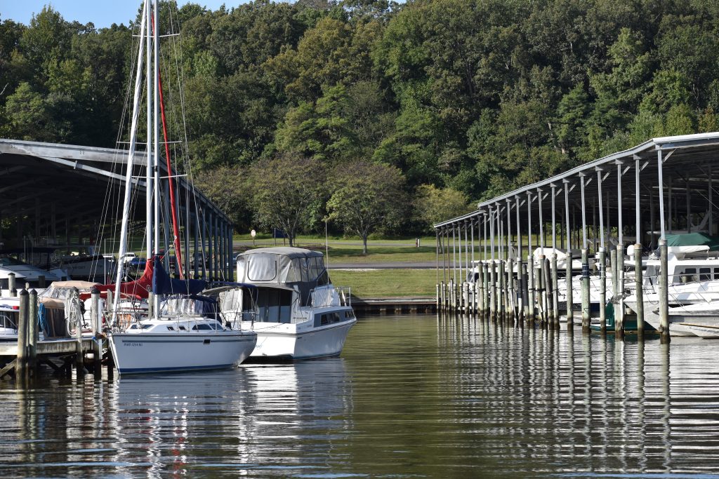 View of waterway with covered slips in the background